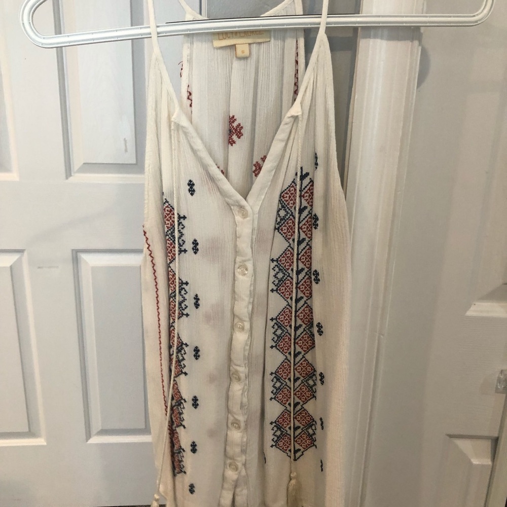 White v neck button down with red and blue design